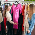 Stylist selects the autumn wardrobe for the client