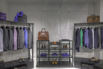 Suits and shoes in clothing store for men